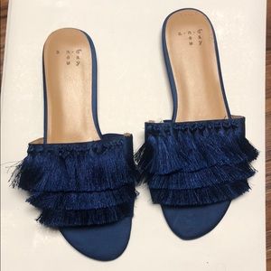 A New Day tassel slides